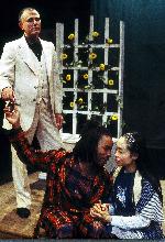 David Greenspan as Mephisto (l), George Hannah as Faust (center) and Eunice Wong as Gretchen